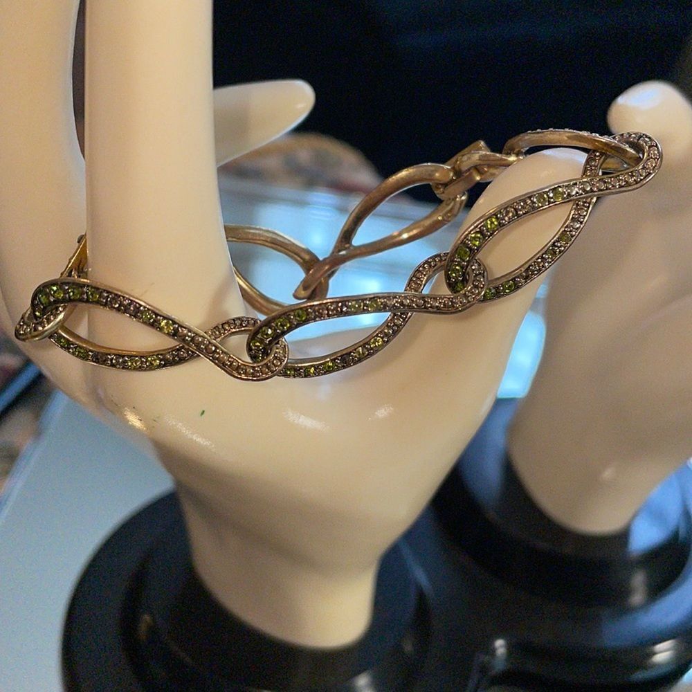 Liz Claiborne gold tone bracelet with light green rhinestones